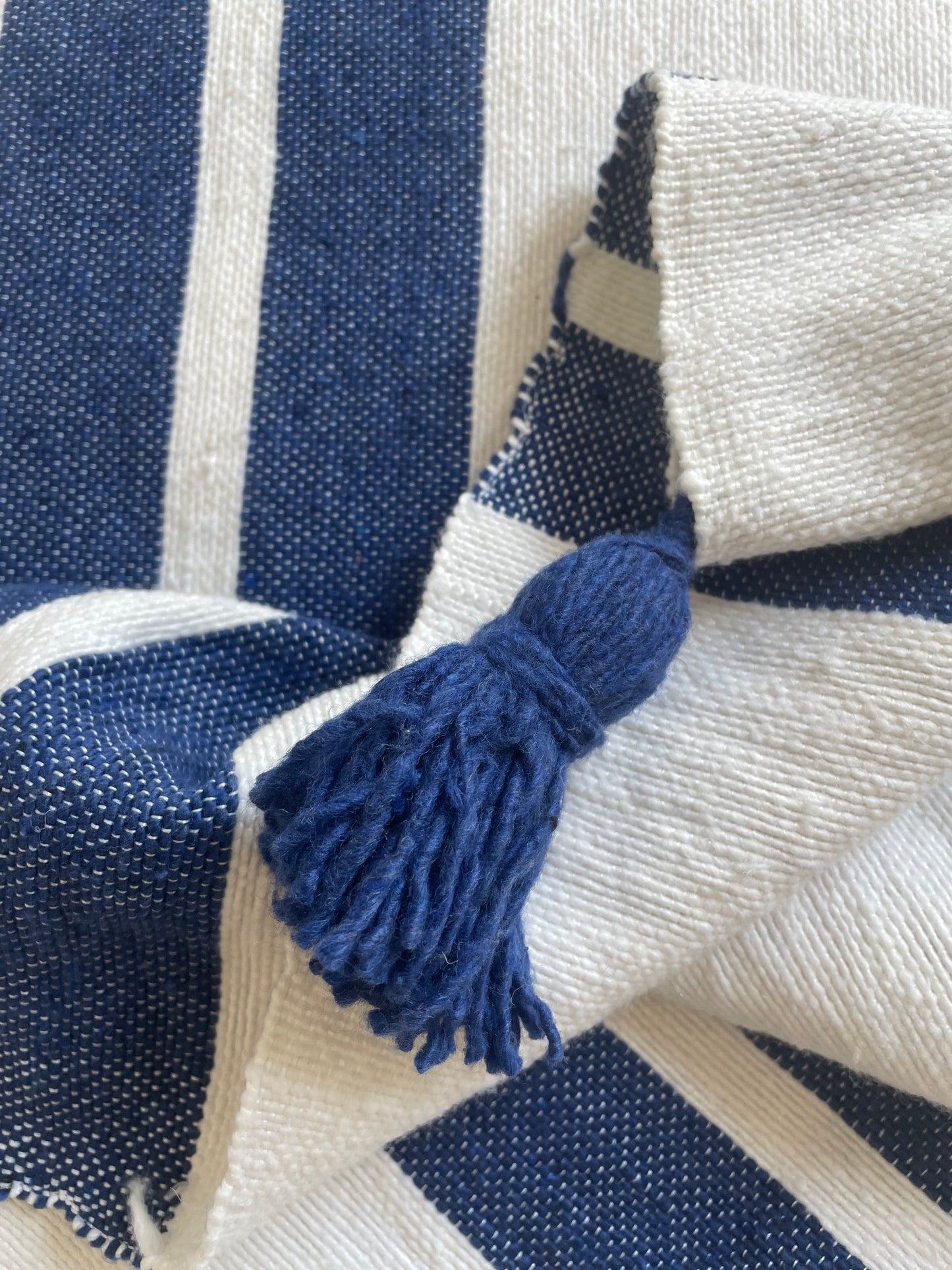 moroccan striped pom pom blanket - blue