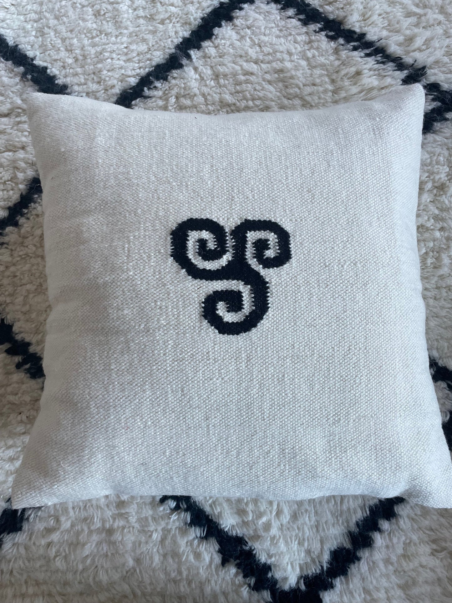 triskele cushion cover